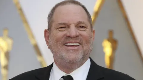 Reuters Harvey Weinstein poses on the Red Carpet after arriving at the 89th Academy Awards in Hollywood, California, February 26, 2017