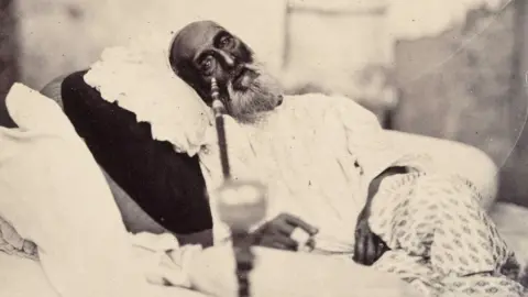 Picture Courtesy – The British Library. The only known photograph of Bahadur Shah Zafar II. The picture was taken by ‘Mr Shepherd the photographer’ after his trial in 1858.