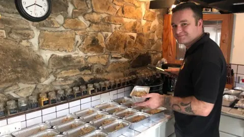 BBC Josh Formby Hugh with roast dinners in trays