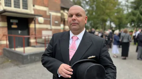 Shaun Whitmore/BBC David Button