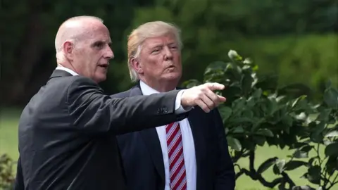 Getty Images Director of Oval Office Operations Keith Schiller (left) and President Donald Trump at the White House