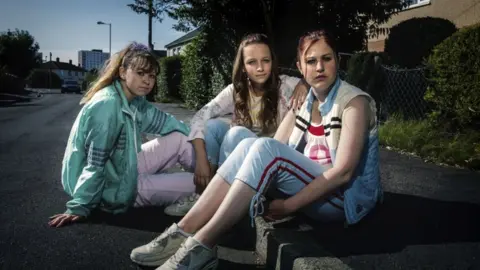 PA Ruby (Liv Hill), Holly (Molly Windsor), and Amber (Ria Zmitrowicz), who appear in the BBC drama Three Girls based on the Rochdale abuse scandal