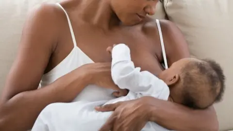 Getty Images A mother breastfeeding her child