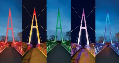 Knowsley Council Greystone Bridge lit up in rainbow colours