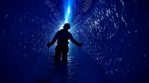 Kelvin Trautman Lewis Pugh in an Antarctic tunnel