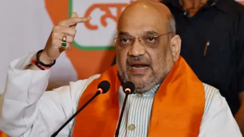 Getty Images Violence took place during BJP chief Amit Shah's rally in Kolkata on Tuesday