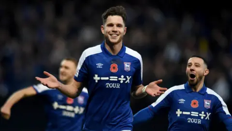 Getty Images George Hirst and Conor Chaplin of Ipswich Town celebrate a goal against Swansea City