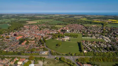 Chris Taylor Photo A bird's eye view of Holt and the coast