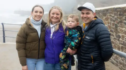 BBC/Rogan Productions/Dan Hall Rose Ayling-Ellis with Katie, Alvie and Joe