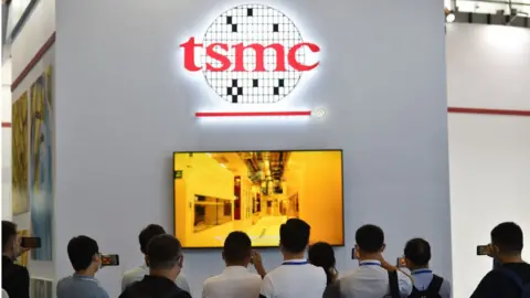 Getty Images Visitors visit the TSMC exhibition area at the 2020 World Semiconductor Conference in Nanjing, East China's Jiangsu province, August 27, 2020. February 28, 2022