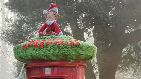 Mairi Scott Peter Pan dressed in a Santa outfit