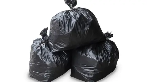 Getty Images Three black bags