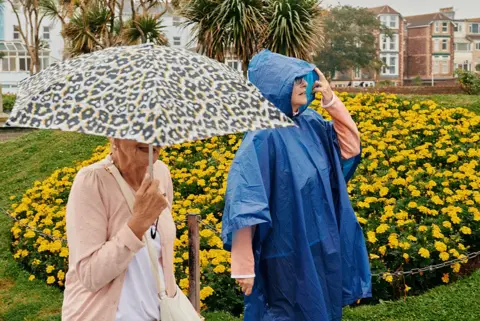 David Hares  Ladies brave the wet August weather