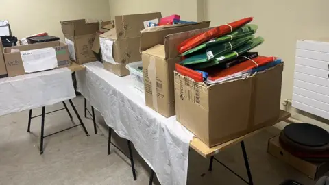 Omagh Uniform Exchange Stationery packs in boxes