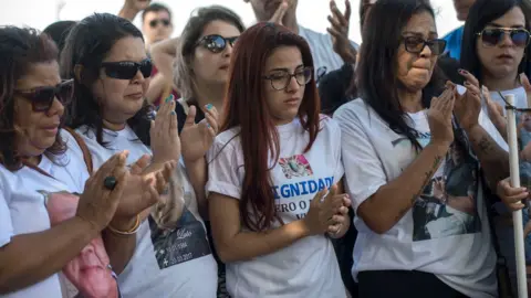 AFP/Getty Images tearful women protesting