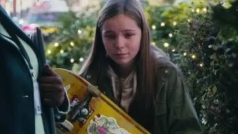 Girl with skateboard