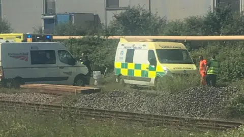 Emergency vehicles on the scene of the accident near Port Talbot on Wednesday