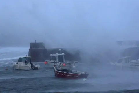 Reuters Waves crash against the breakwater of the port during Storm Ciaran at Goury near Cherbourg, Normandy, France, November 2, 2023