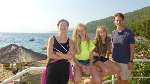 Family handout Sam left, Chris right