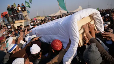 AFP / Getty Images Pakistani protesters from the Tehreek-i-Labaik Yah Rasool Allah Pakistan (TLYRAP) religious group carry the coffin of a protester who was killed on 25 November 2017