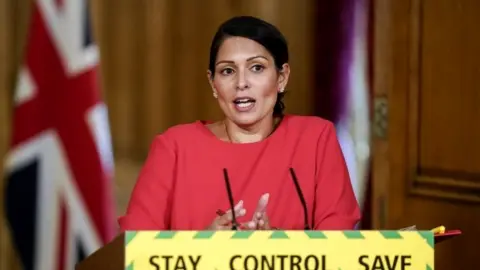 PA Media Home Secretary Priti Patel