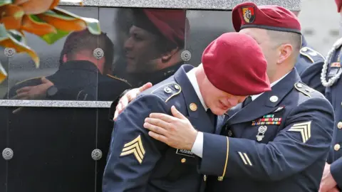 Reuters An unidentified honour guard member cries at the graveside service for Sgt La David Johnson