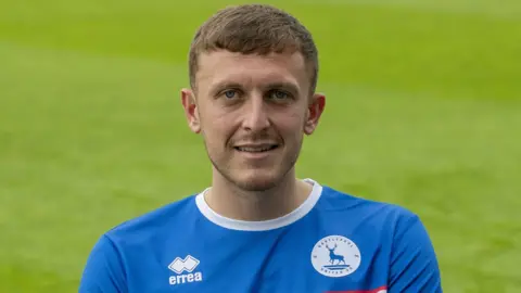 Getty Images Oliver Finney in a hartlepool shirt