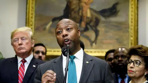 Getty Images Republican Senator Tim Scott defended Mr Trump's sentiment but not his language