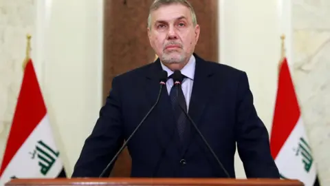 EPA File photo showing Mohammed Tawfiq Allawi making a speech in Baghdad, Iraq (1 February 2020)