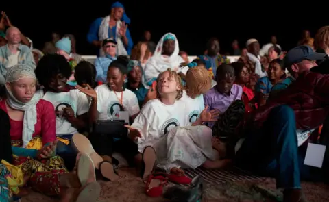 AFP Children watching the concert with Salif Keita