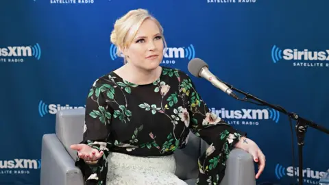 Getty Images Meghan McCain joins host Julie Mason during a SiriusXM event on February 5, 2018 in New York City.