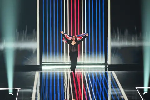 Anthony Devlin / Getty Images UK Entry Mae Muller on stage during The Eurovision Song Contest 2023