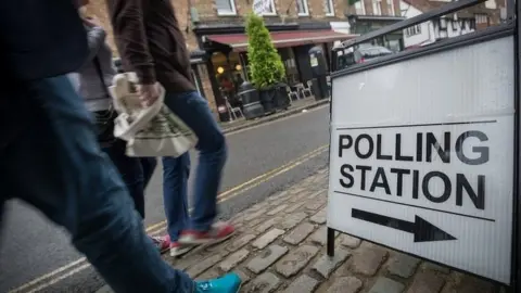 Getty Images Voters outside polling station in Berkshire
