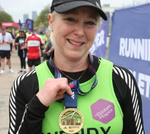 Wendy Kelway Wendy Kelway with her medal at the end of the Manchester Marathon in 2023