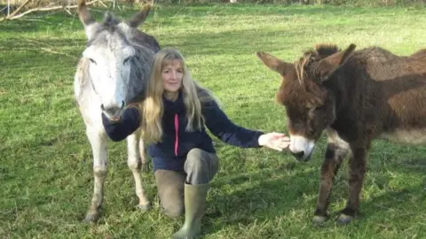 Penny Jones Animal Hospice Elizabeth with donkeys