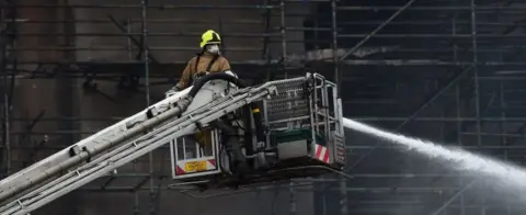 Getty Images Firefighter at the scene