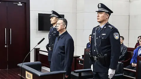 AFP This handout photo taken on January 21, 2020 and released by the Tianjin First Intermediate People"s Court shows former Interpol chief Meng Hongwei in court