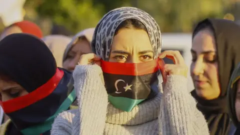 AFP Demonstrators take part in a rally against eastern Libyan strongman Khalifa Haftar