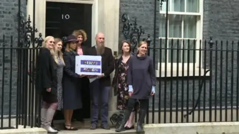 BBC Parents handing in a petition at Downing Street