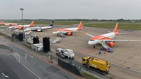 Getty Images Grounded planes at Luton