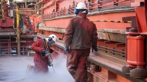 Getty Images Oil rig workers