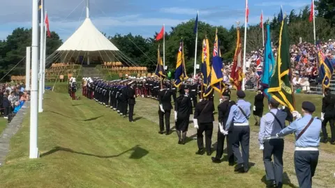 Crowds line the walkway