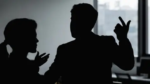 Getty Images Woman and man arguing