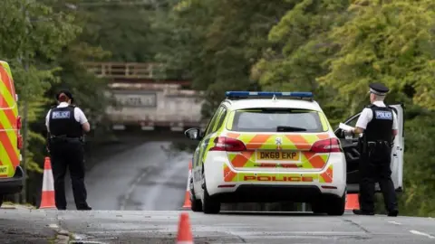 Jason Roberts photography Police at the scene of the incident