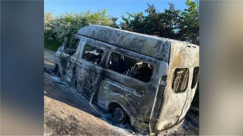 Stacey Bramley A burnt out Transit van