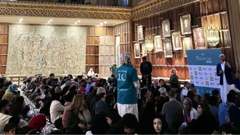 Cambridge Central Mosque people at iftar at King's College Cambridge