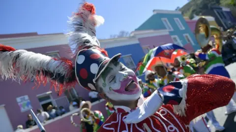 EPA A dancer performing in the Bo Kaap district of Cape Town