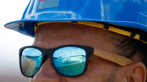 Getty Images Gas worker in hard hat