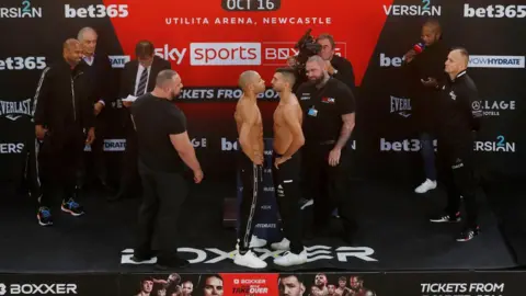 Reuters Chris Eubank Jnr and Wanik Awdijan pose head to head during the weigh-in