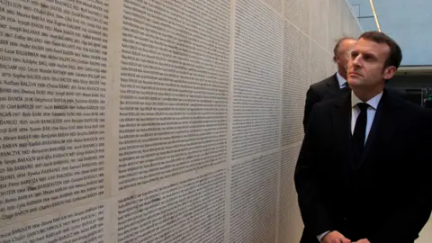 AFP Macron and remembrance wall